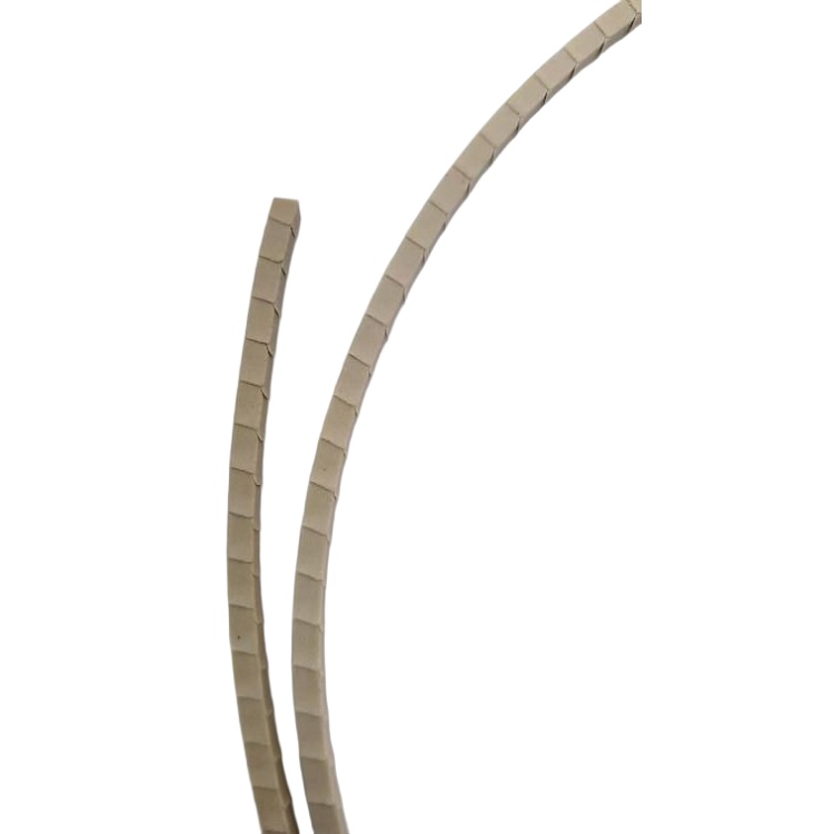 The image "企业微信截图_20250628110930.png" shows an abstract design featuring two curved, interlocking structures. These structures are composed of beige-colored, rectangular blocks arranged in a segmented, brick-like pattern. The forms appear to be modular and rise in paired arches, creating a visually balanced and geometric sculpture. The material has a light brown tone, giving it a cohesive and harmonious appearance against the plain white background.